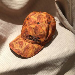 Philip Morris USA women orange with leafy print baseball cap